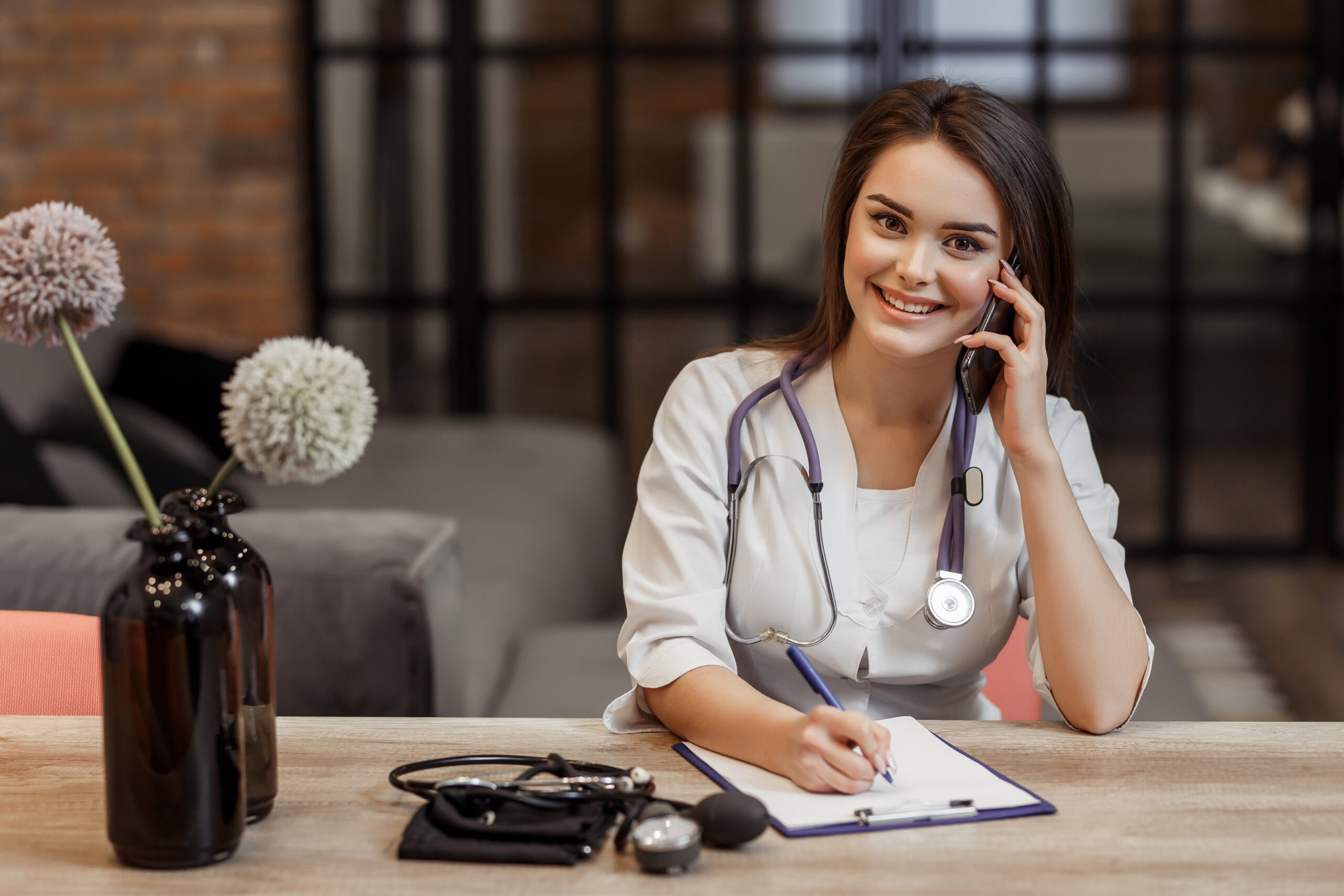 Beautiful young female medical and private doctor is looking at